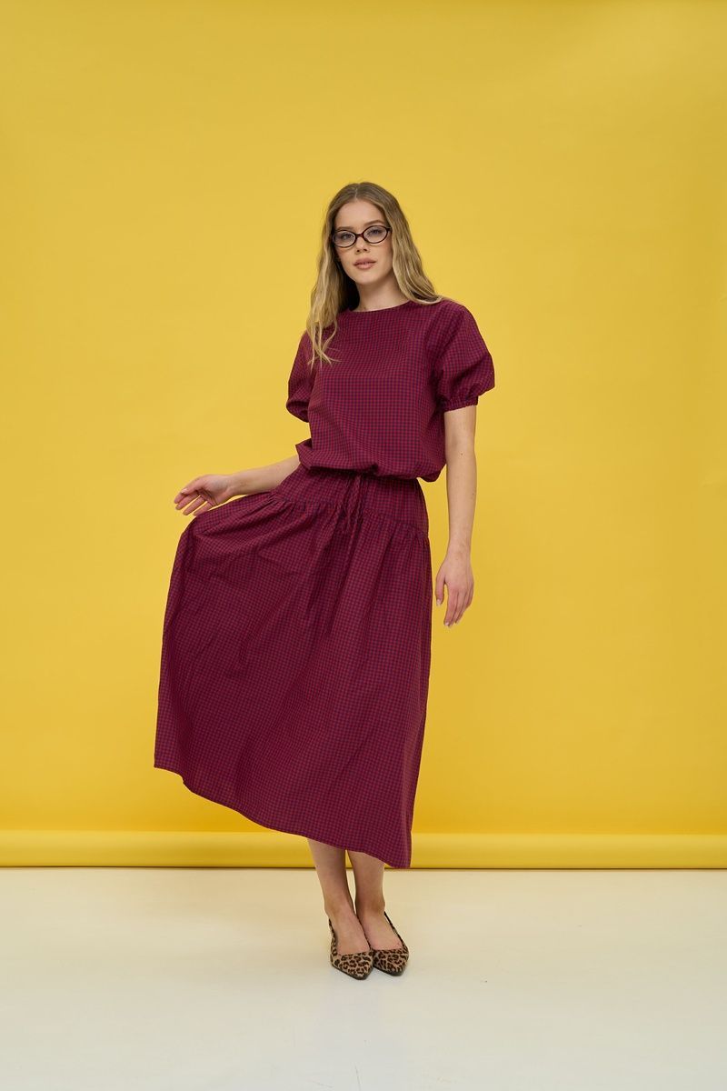 Women's dark blue suit with a skirt in red check