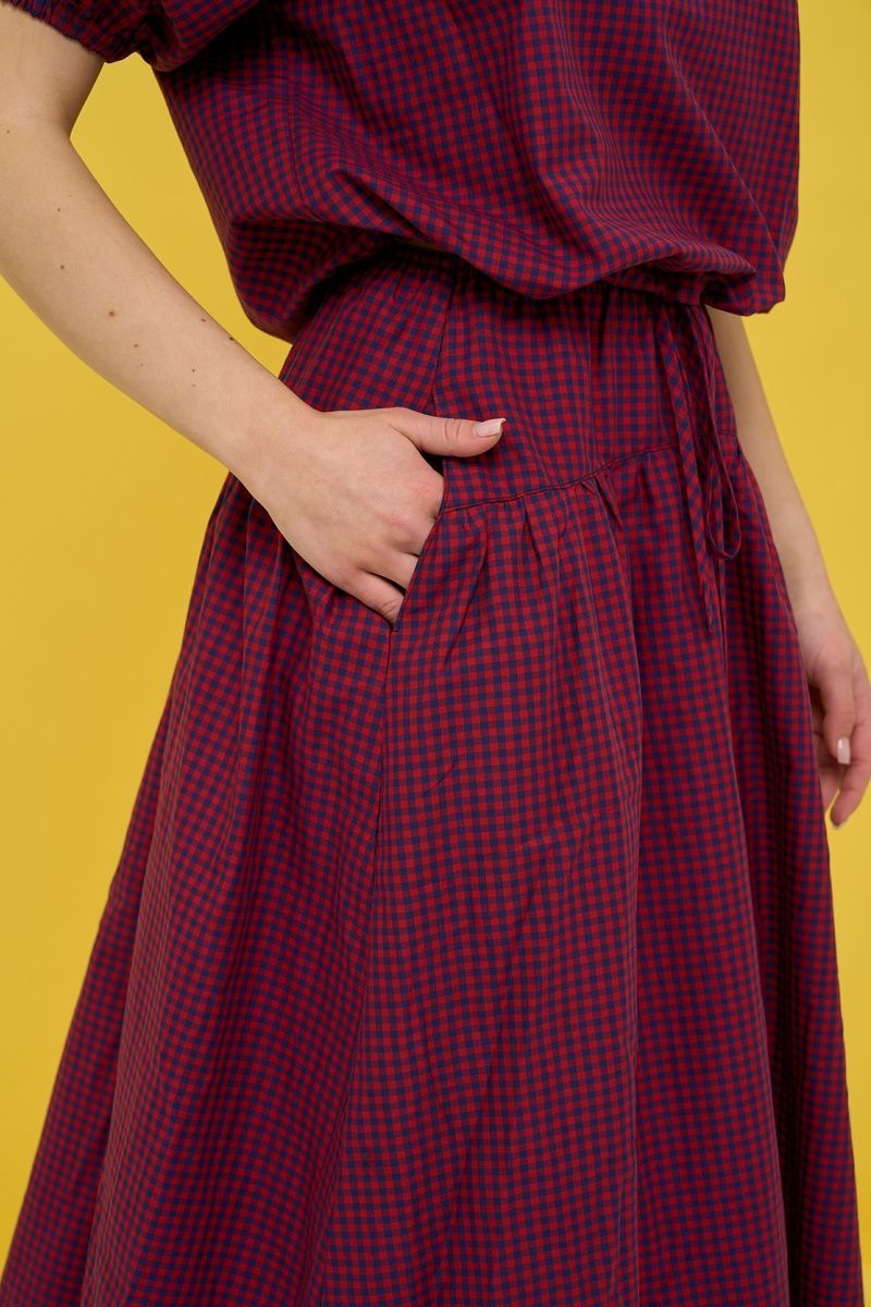 Women's dark blue suit with a skirt in red check