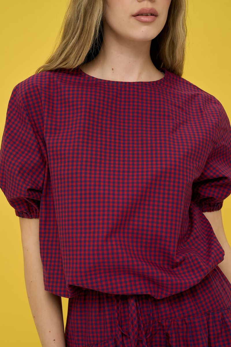 Women's dark blue suit with a skirt in red check