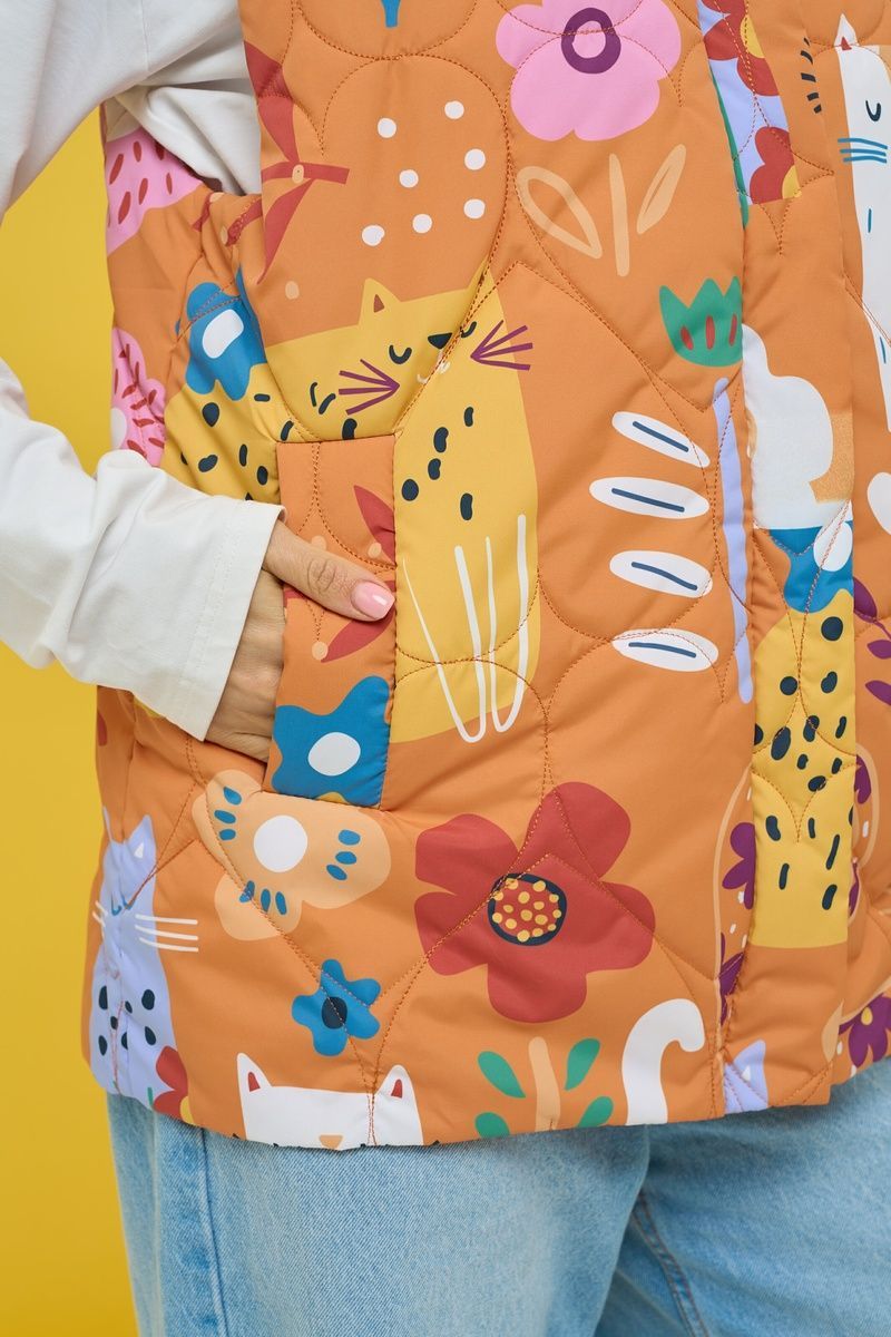 Women's insulated orange vest with an 'Ethnic Cats' print