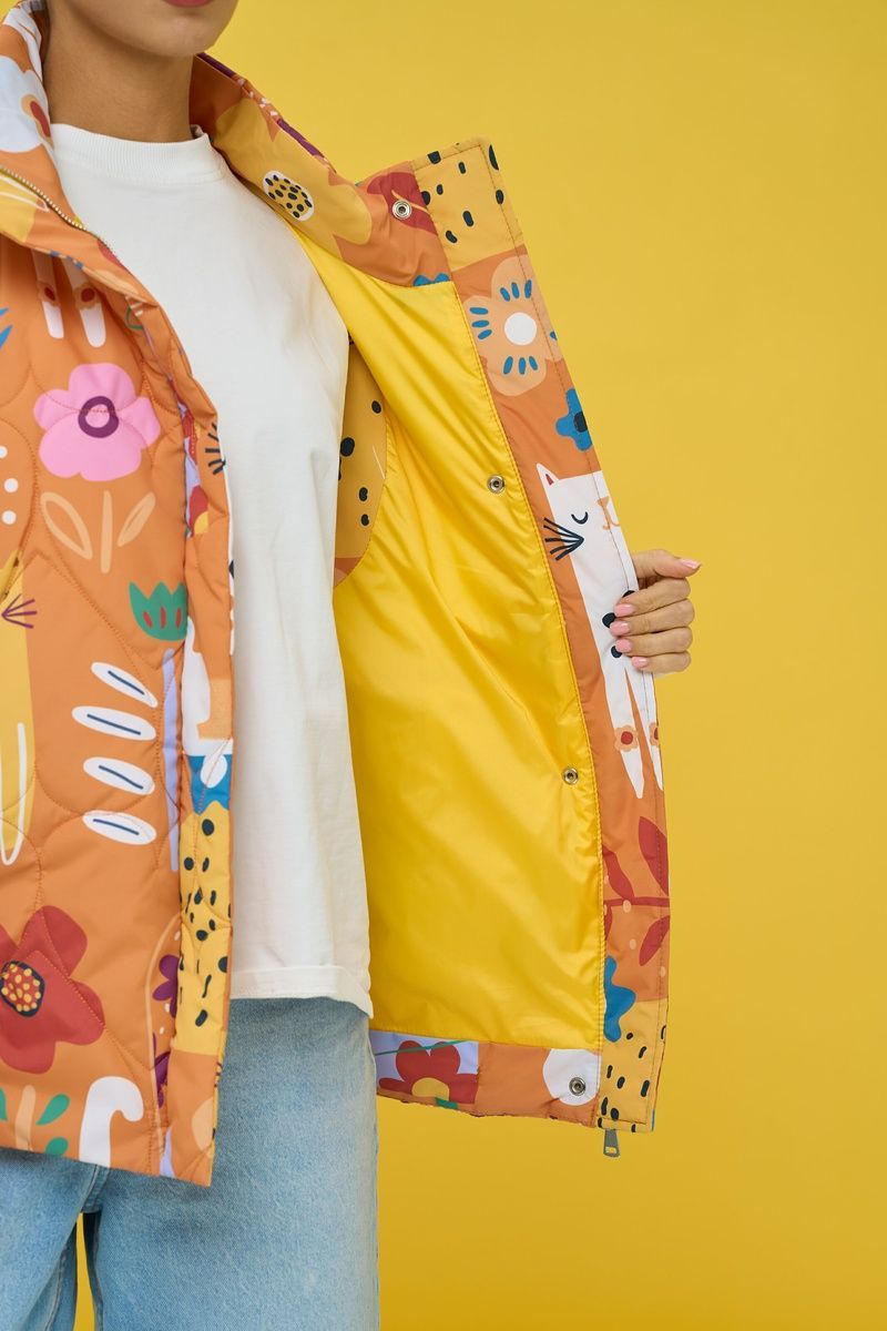 Women's insulated orange vest with an 'Ethnic Cats' print