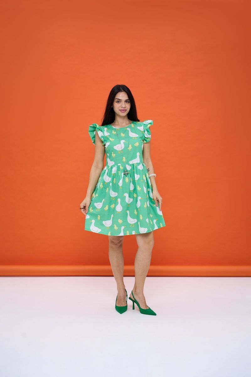 Cotton mini sundress in light green with "Geese" print