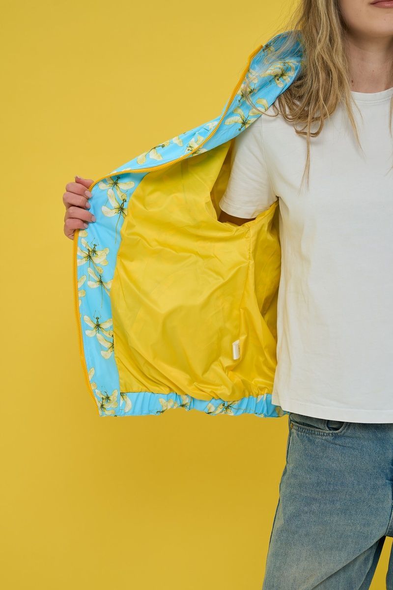 Women's oversized light blue windbreaker with a 'Dragonfly' print