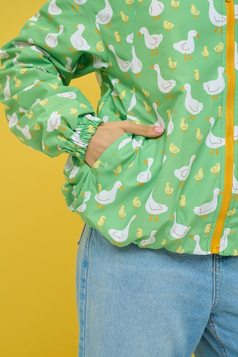 Women's oversized light green windbreaker with a 'Geese' print